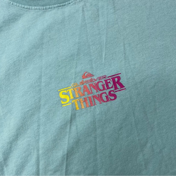 Quicksilver x Strangers Things Short Sleeve Graphic T-Shirt in Teal Blue Neon - Picture 4 of 6